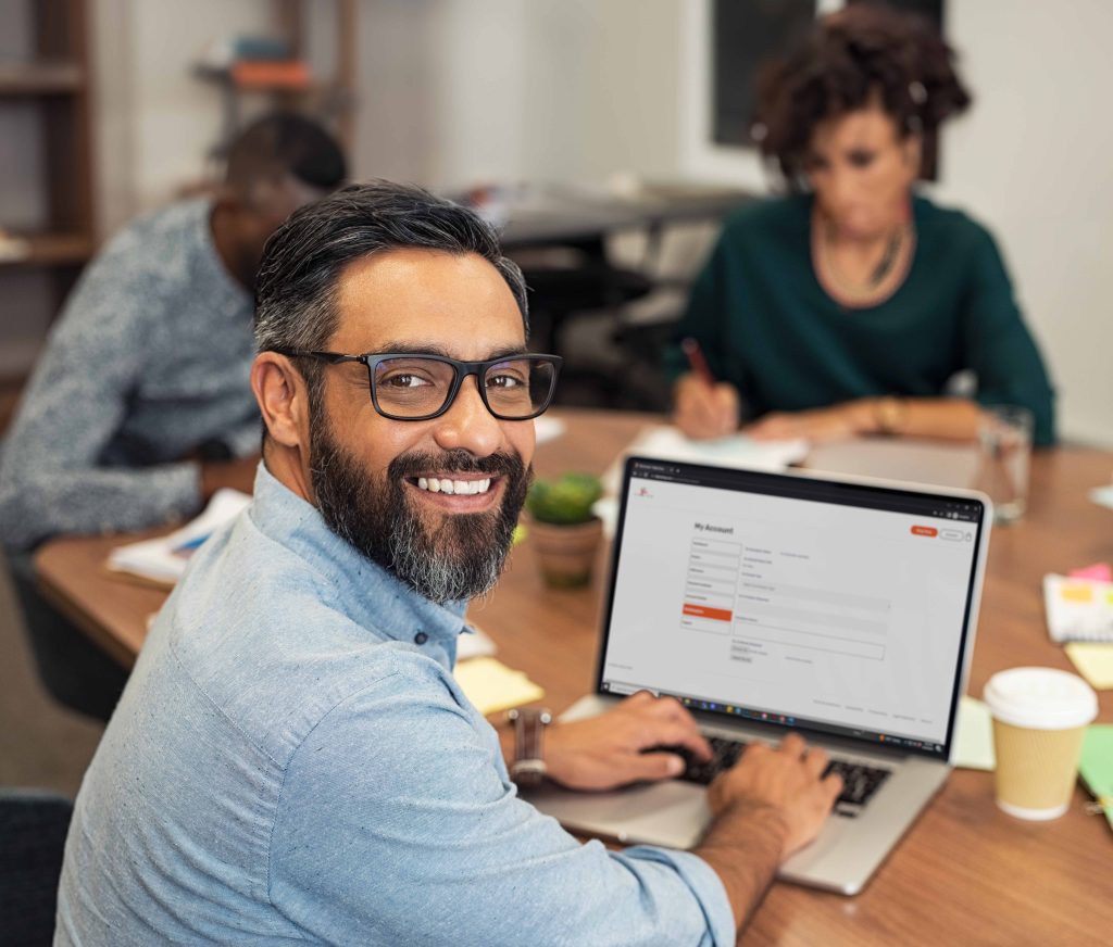 man creating an account in a laptop