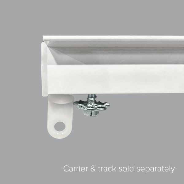 Close-up of one end of a drapery track that shows the Fabtex drapery end cap and return carrier.