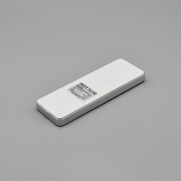 Back view of the Fabtex handheld, 15-channel remote/control. It shows the battery compartment.