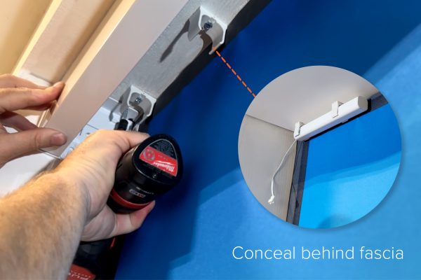 Photo of how the Fabtex external battery pack can be mounted inside the window jamb, while being concealed by the fascia.